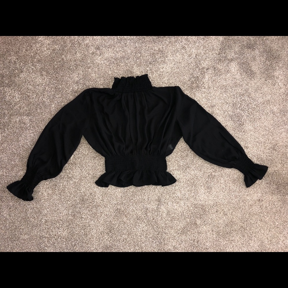 Black turtleneck blouse